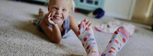 Cassie Trammell Loftin, Dallas Cowboys Cheerleader wearing iNFable socks Foster Care Awareness socks